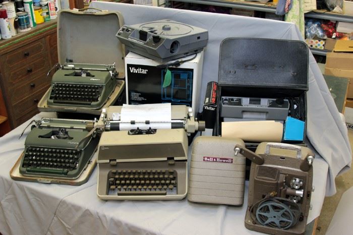 vintage typewriters, 8mm film projector, Kodak and Vivitar 35mm Carousel slide projectors