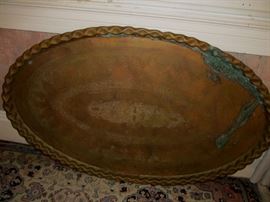 huge copper or brass hand chased tray, outside looks like aged copper