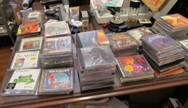 Many CD's & DVD's 