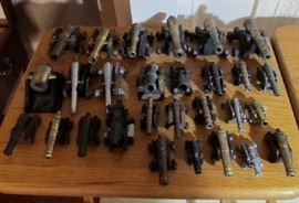 Whole table of miniature canons just found in back shed. 