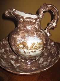 Metal watering pitcher