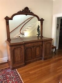 Mirror is included in this fabulous piece that would make an awesome bar! 