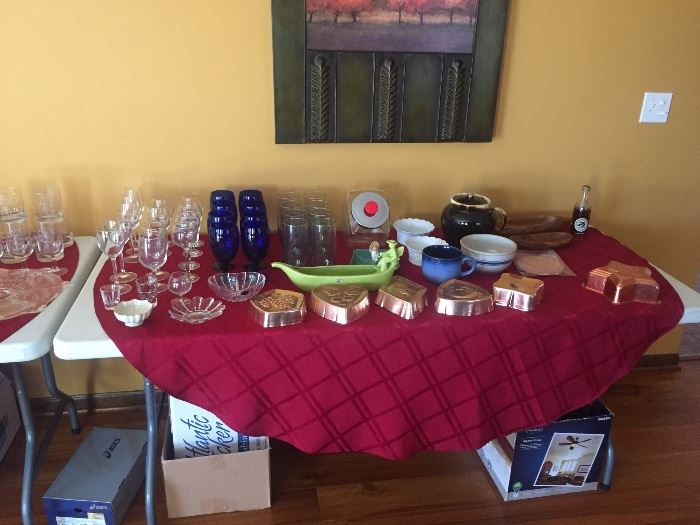 Assorted Wine Glasses, Cobalt blue Water/Wine Goblets, Porcelain bowls made by Kaiser, serving piece by Royal-Haeger, Pfaltzgraff Cookie Jar, Commemorative Coca-Cola bottle, and more.