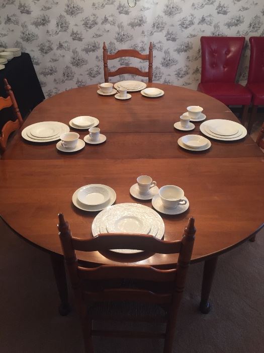 Wedgwood china in the Patrician (old) Pattern.  Dining Room Table by Sprague Carleton (shown with 2-12" leaves), ladder-back chairs.