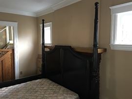 A HUGE 4 Poster king size bed.