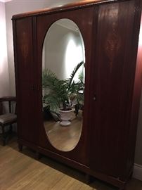 Amazing antique Armoire with mother of pearl inlay.