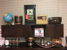 Antique clock and vintage radios.