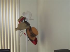 TONS OF HATS on hall tree