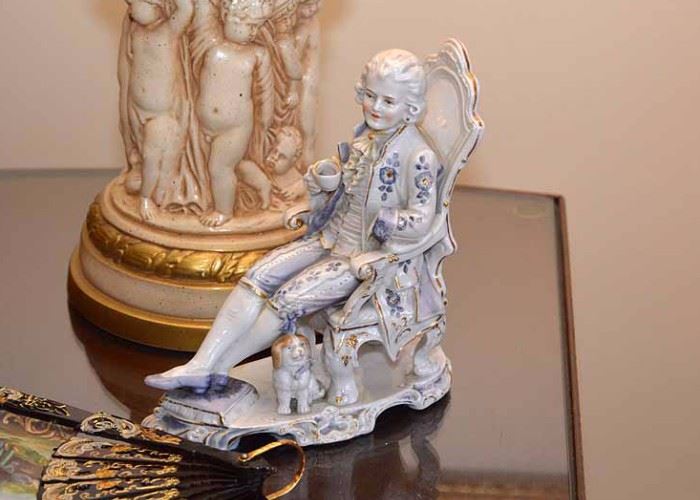 Vintage Porcelain Figure (Man in Chair with Dog)