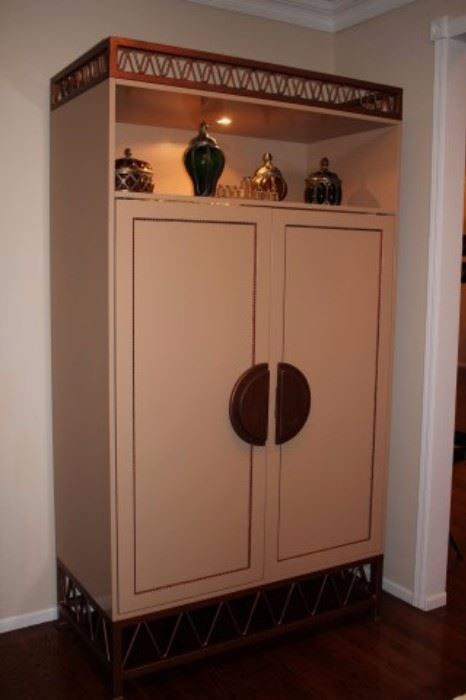 Armoire with Lit Top Shelf and Decorative
