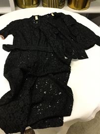 Dress #44.   black lace short sleeve dress with long sleeve lace jacket and self belt.  repairs on left sleeve and and left back of dress, jacket is pristine.  bust 40", shoulder 28", waist 32"