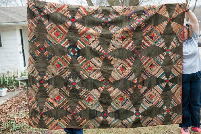 Courthouse Steps or Pineapple Log Cabin quilt.    some fraying on seam separations only