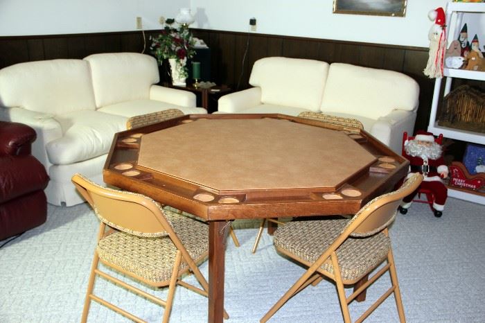 Game Table, Pair of White Loveseats in Background