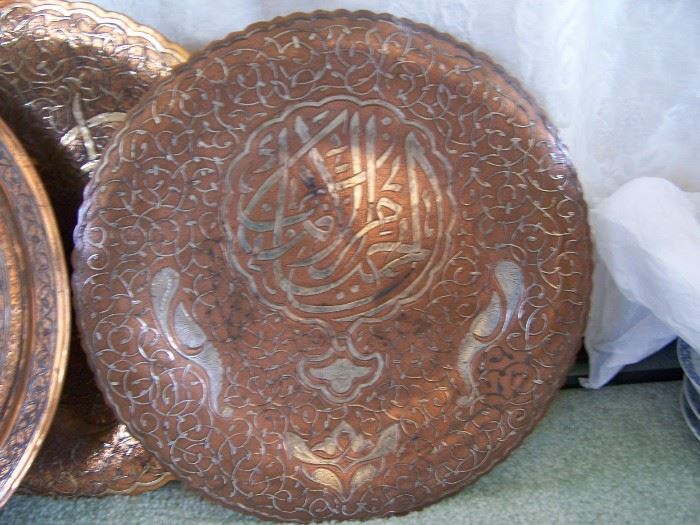 ottoman islamic plates covered in silver inlay 