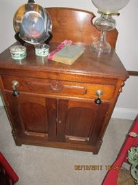 Antique Wash stand, back splash with pull out towel holder.  