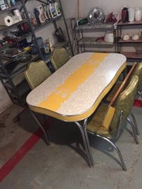 Vintage table with leaf and 4 chairs...great shape