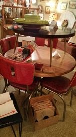 Midcentury Modern Lane round coffee table, kitchen table, four red diner chairs