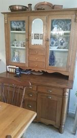 Nice antique solid oak kitchen cabinet.  . The flour and corn meal bins are neatly hidden behind a hinged door. 