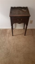 Vintage Phone Stand with drawer for storage.