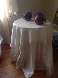 Small round table with table cloth $5.00 Teacup/teapots $1.00 each
