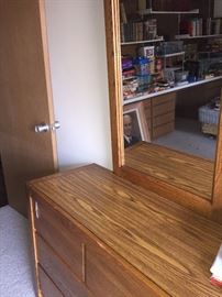 Dresser has matching twin beds and nightstands