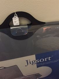 Jigsort - stores and manages partially completed jigsaw puzzles