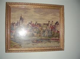 Framed tapestry under glass