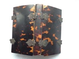 Note two missing pieces of cover