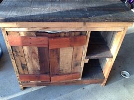 Rough cut wooden cupboard- great reclaimed wood look