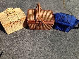 Different styles of picnic baskets, some with built in plates