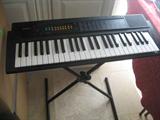 Casio keyboard and stand
