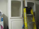 wood and glass cabinets