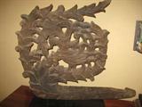 heavily carved wooden statues