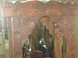 heavily carved mirrors