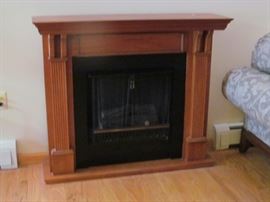 fake fireplace uses sterno. Nice look!!