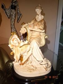 Handmade Italian porcelain figurine. (a mother and her baby)