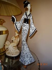 Handmade and hand-painted vintage porcelain China Geisha Girl