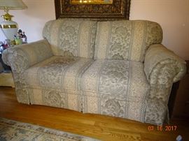 Vintage fabric handmade two-seater sofa in beautiful shape.