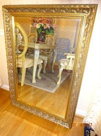 Vintage gold-trim hanging mirror. Great decorative piece