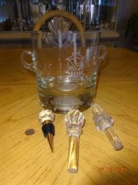 Three beautiful glass wine stoppers and glassware