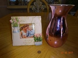 A picture frame by Sonoma and another vase