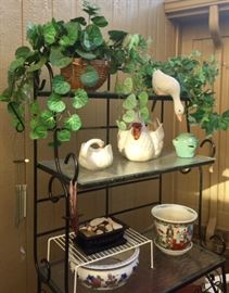 Green Metal & Tempered Glass Rack filled with Planters and Garden Items