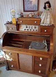 Unique large radio console shaped like a roll top desk