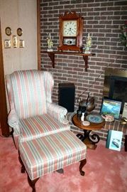 Upholstered wingback chair and ottoman, small iron / wood table