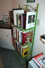 Metal shelf with books