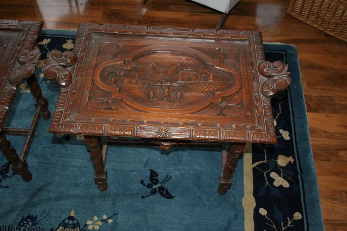 Pair of carved side tables with glass tray tops