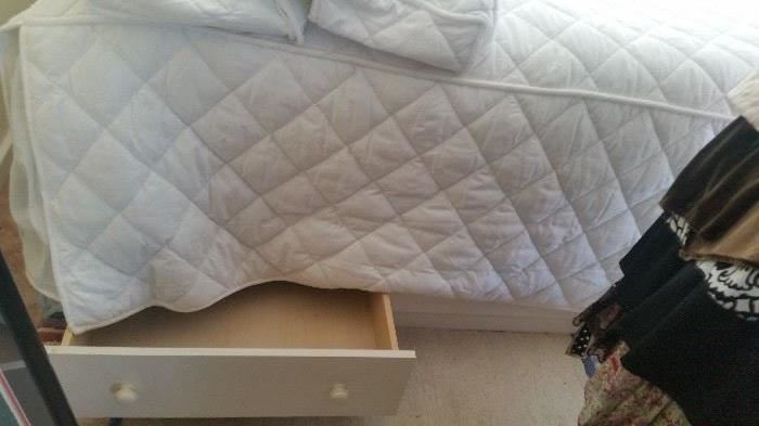 This is a twin captains bed with mattress and box spring.  The bedding is sole separate.