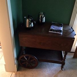 Serving cart with folding extension and vintage coffee pots