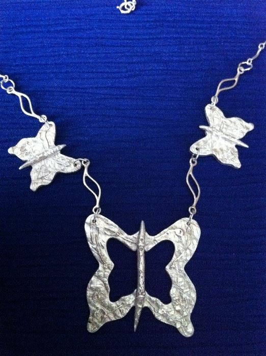One-of-a-kind fine silver three butterflies pendant with sterling accents designed and created by seller. Other fine silver pendants and earrings will be included in this sale.
