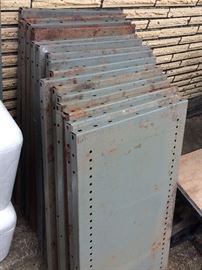 Metal garage shelves with brackets in separate photo.